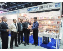 Virender Kumar Arya (from right) presenting a Book 